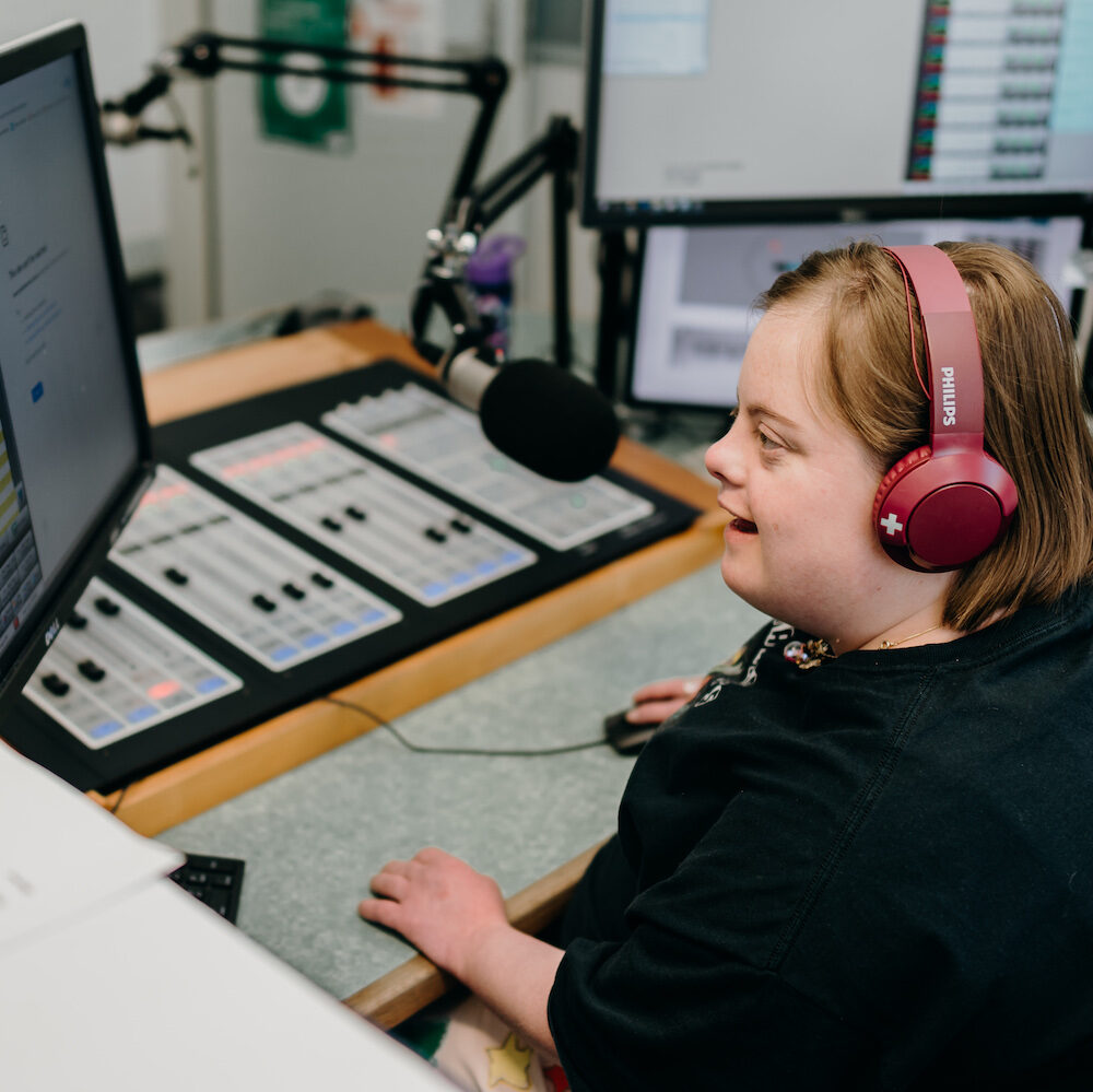 young woman working in radio announcing